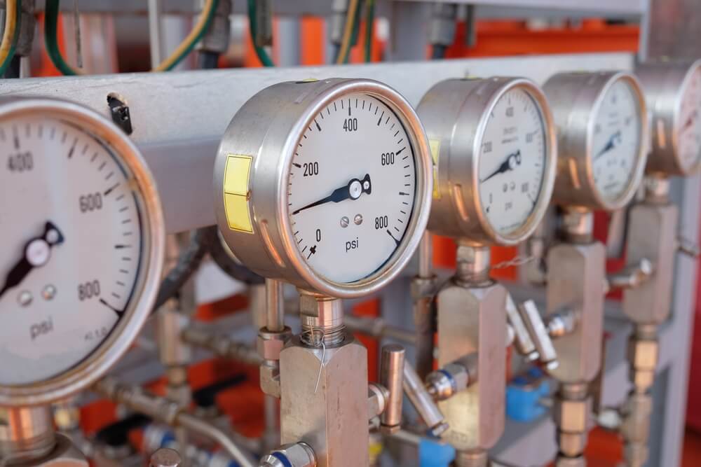 Pressure gauge, measuring instrument close up on pneumatic control system.